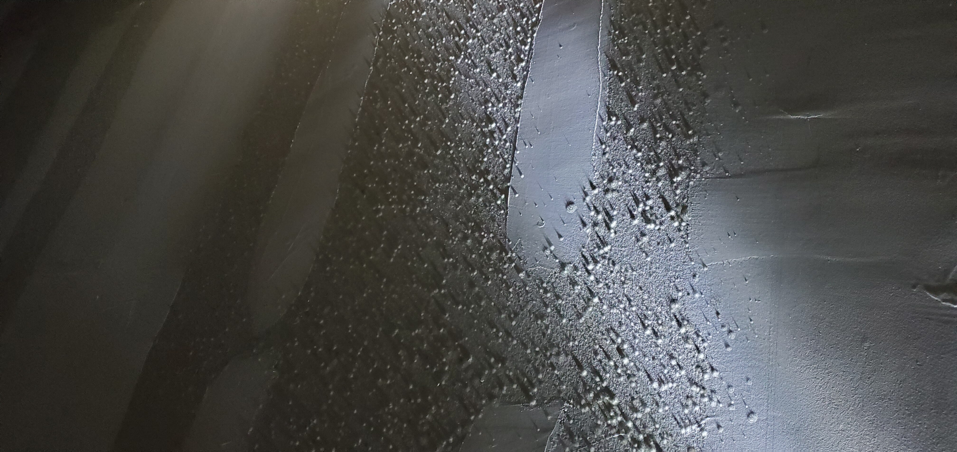 Drywall Wall obvious signs of SVMG - Same location and time with light indicating mold
