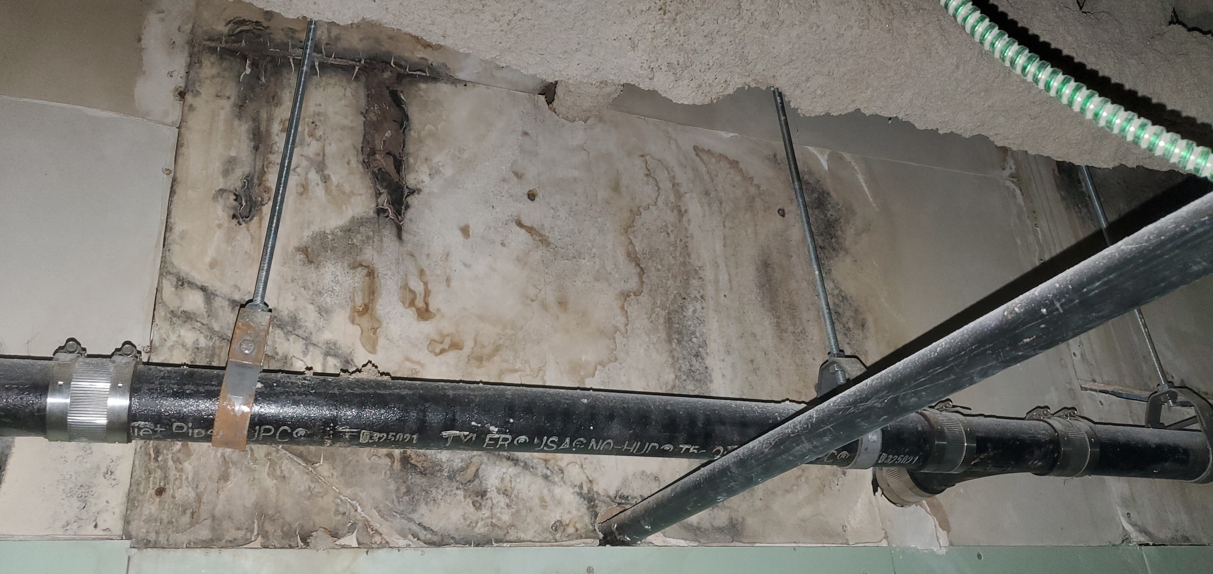 Drywall with SVMG above ceiling from flooding on floor above